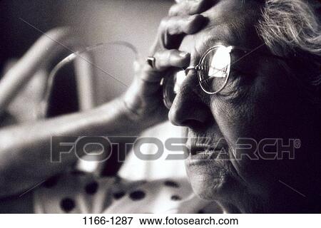 Stock Photo - people, eyeglasses, senior, patient, worry, hospital, living. Fotosearch
