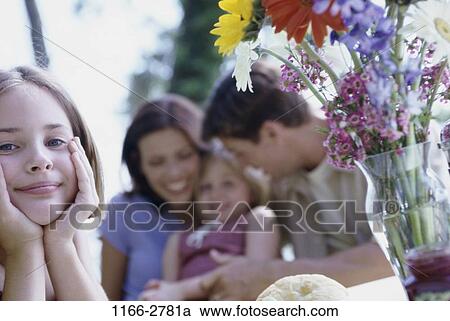 people, flowers, outdoors, relaxing, family, vase, bouquet View Large Photo Image Stock Image - people, flowers, outdoors, relaxing, family, vase, bouquet. Fotosearch