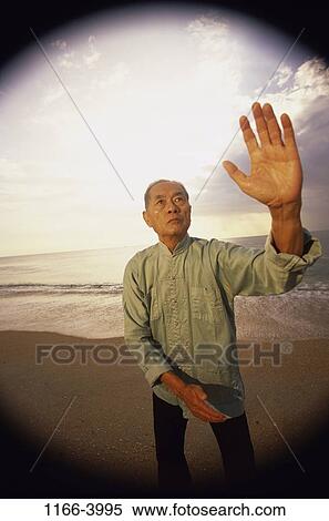 people, hand, Asian, beach, health, Middle-aged View Large Photo Image Stock Photography - people, hand, Asian, beach, health, Middle-aged. Fotosearch