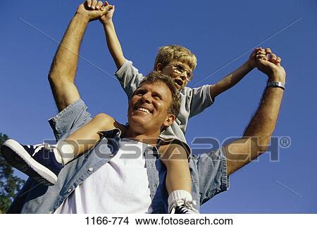 people, hands, riding, stretching, holding, outdoors, carrying View Large Photo Image Picture - people, hands, riding, stretching, holding, outdoors, carrying. Fotosearch