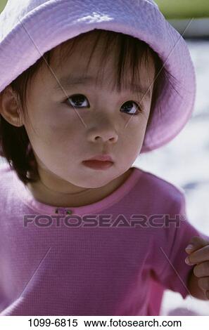 people, hat, Asian, pink, toddler, girl, outdoors View Large Photo Image Stock Photography - people, hat, Asian, pink, toddler, girl, outdoors. Fotosearch