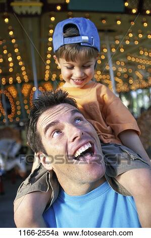 people, hat, riding, carnival, outdoors, park, amusement View Large Photo Image Stock Image - people, hat, riding, carnival, outdoors, park, amusement. Fotosearch