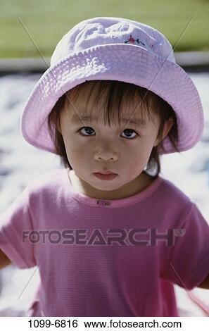 people, hat, staring, Asian, pink, toddler, girl View Large Photo Image Stock Photograph - people, hat, staring, Asian, pink, toddler, girl. Fotosearch