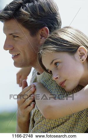 people, head, leaning, outdoors, hugging, resting, family View Large Photo Image Stock Photo - people, head, leaning, outdoors, hugging, resting, family. Fotosearch