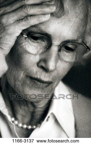 people, headache, woman, eyeglasses, senior, stress, pearls View Large Photo Image Stock Photo - people, headache, woman, eyeglasses, senior, stress, pearls. Fotosearch