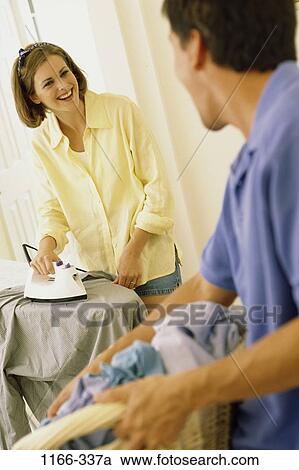 people, home, smiling, couple, basket, teamwork, smile View Large Photo Image Stock Image - people, home, smiling, couple, basket, teamwork, smile. Fotosearch