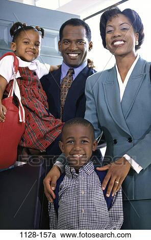 people, home, smiling, open, standing, doorway, carrying View Large Photo Image Stock Image - people, home, smiling, open, standing, doorway, carrying. Fotosearch
