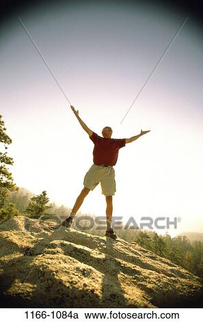 people, isolation, senior, outdoors, rocks, achievement View Large Photo Image Stock Image - people, isolation, senior, outdoors, rocks, achievement. Fotosearch
