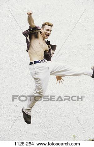 Picture - people, jump, jumping, excitement, excited, happy. Fotosearch
