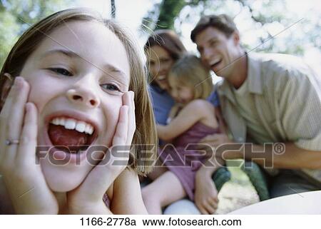 people, laughing, girl, outdoors, joyous, family, daughters View Large Photo Image Stock Image - people, laughing, girl, outdoors, joyous, family, daughters. Fotosearch