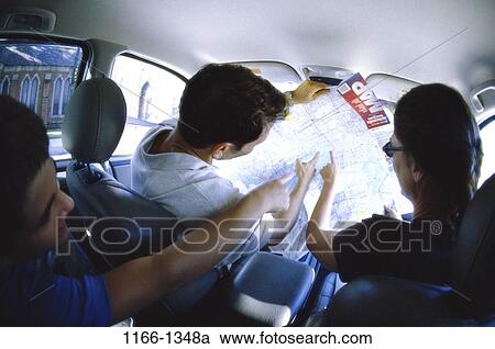 people, lost, map, car, pointing, chaotic, point View Large Photo Image Stock Image - people, lost, map, car, pointing, chaotic, point. Fotosearch
