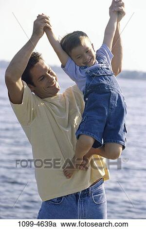 people, male, Hispanic, lake, outdoors, strength, joyous View Large Photo Image Stock Image - people, male, Hispanic, lake, outdoors, strength, joyous. Fotosearch