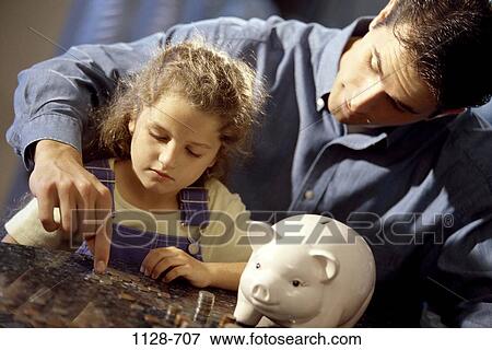 Stock Photo - people, money, accuracy, teamwork, family, child, learning. Fotosearch