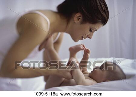 people, mother, baby, nurturing, unity, family View Large Photo Image Stock Image - people, mother, baby, nurturing, unity, family. Fotosearch