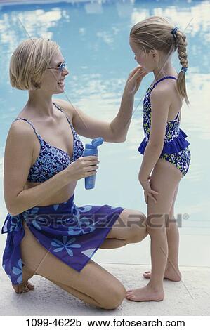 people, mother, beach, family, parent, Mothers outdoors water View Large Photo Image Stock Image - people, mother, beach, family, parent, Mothers outdoors water. Fotosearch