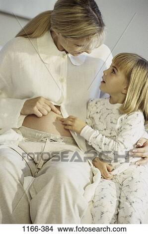 people, mother, stomach, family, blond, touching, daughter View Large Photo Image Picture - people, mother, stomach, family, blond, touching, daughter. Fotosearch