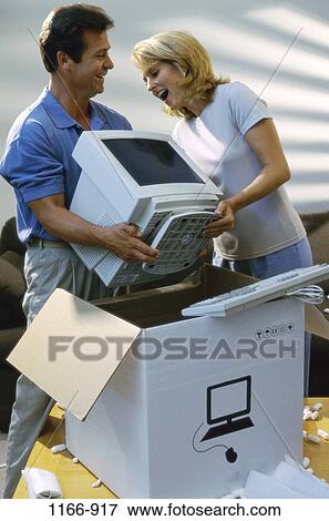 people, new, couple, computer, Middle-aged, surprise View Large Photo Image Stock Photo - people, new, couple, computer, Middle-aged, surprise. Fotosearch