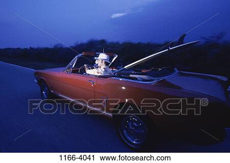 people, night, road, car, driving, convertible View Large Photo Image Stock Image - people, night, road, car, driving, convertible. Fotosearch