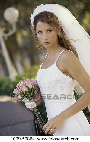 people, outdoors, wedding, bouquet, brunette, bride, Caucasian View Large Photo Image Stock Image - people, outdoors, wedding, bouquet, brunette, bride, Caucasian. Fotosearch