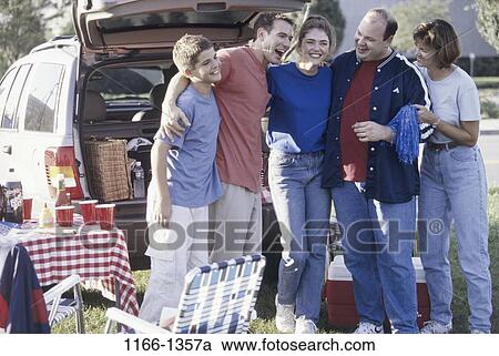 people, party, smiling, car, laughing, outdoors View Large Photo Image Stock Image - people, party, smiling, car, laughing, outdoors. Fotosearch