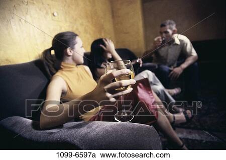 people, party, talking, sitting, wine, drinking View Large Photo Image Stock Image - people, party, talking, sitting, wine, drinking. Fotosearch