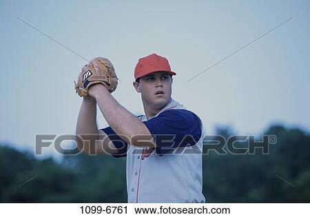 Stock Image - people, playing, baseball, outdoors, sports, cap. Fotosearch