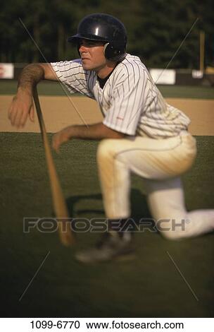 people, playing, bat, helmet, baseball, leaning View Large Photo Image Stock Image - people, playing, bat, helmet, baseball, leaning. Fotosearch