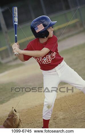 people, playing, bat, helmet, baseball, swinging, swing View Large Photo Image Stock Photography - people, playing, bat, helmet, baseball, swinging, swing. Fotosearch