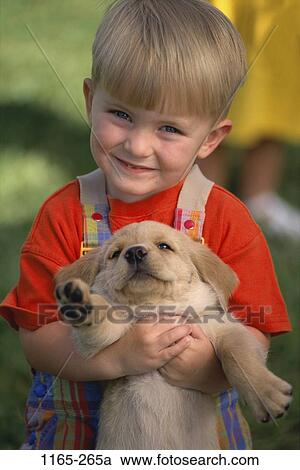 people, playing, dog, puppy, pet, toddler, holding View Large Photo Image Stock Image - people, playing, dog, puppy, pet, toddler, holding. Fotosearch