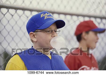 Picture - people, playing, eyeglasses, baseball, boy, bubble, outdoors. Fotosearch
