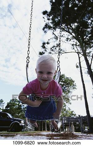 people, playing, hanging, swinging, girl, swing, playground View Large Photo Image Stock Image - people, playing, hanging, swinging, girl, swing, playground. Fotosearch