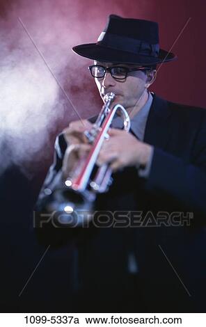 Stock Image - people, playing, hat, smoke, eyeglasses, music. Fotosearch