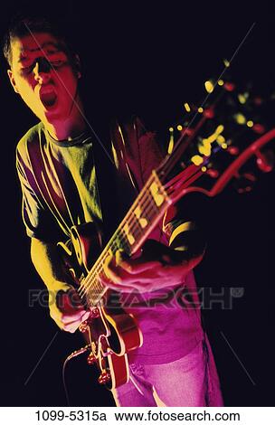 people, playing, music, guitar, arts, entertainment View Large Photo Image Stock Image - people, playing, music, guitar, arts, entertainment. Fotosearch