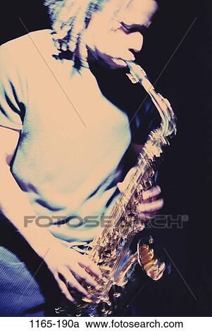 people, playing, music, motion, entertainment, play View Large Photo Image Stock Image - people, playing, music, motion, entertainment, play. Fotosearch