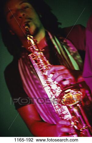 Stock Image - , people, playing, music, entertainment, play. Fotosearch