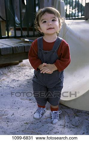 people, playing, toddler, sliding, playground, boy, standing View Large Photo Image Stock Image - people, playing, toddler, sliding, playground, boy, standing. Fotosearch