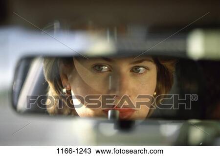 people, reflection, woman, car, driving, mirror, outdoors View Large Photo Image Stock Image - people, reflection, woman, car, driving, mirror, outdoors. Fotosearch