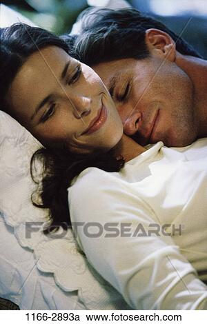 people, relaxation, smiling, sleeping, couple, resting, smile View Large Photo Image Stock Image - people, relaxation, smiling, sleeping, couple, resting, smile. Fotosearch