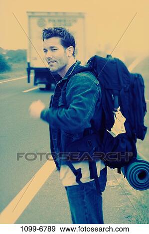 people, road, backpack, outdoors, brunette, vehicle View Large Photo Image Stock Photo - people, road, backpack, outdoors, brunette, vehicle. Fotosearch