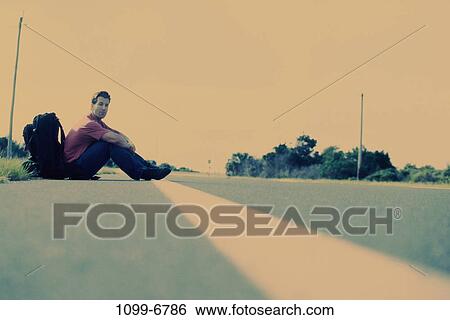 people, road, sitting, backpack, outdoors, background View Large Photo Image Stock Photograph - people, road, sitting, backpack, outdoors, background. Fotosearch