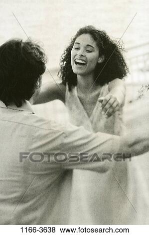 Stock Photo - people, running, couple, happy, laughing, outdoors, romantic. Fotosearch