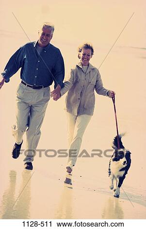 people, running, walking, dog, couple, senior, pet View Large Photo Image Stock Image - people, running, walking, dog, couple, senior, pet. Fotosearch