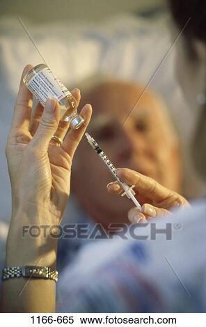 Stock Photography - people, senior, patient, nurse, injection, shot, medicine. Fotosearch
