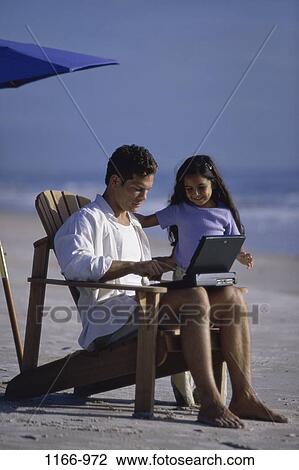 people, sitting, computer, laptop, beach, family, father View Large Photo Image Stock Image - people, sitting, computer, laptop, beach, family, father. Fotosearch