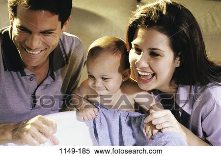Stock Photography - people, smiling, baby, laughing, looking, towel. Fotosearch