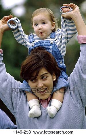 people, smiling, excitement, mother, Hispanic, happy, toddler View Large Photo Image Stock Image - people, smiling, excitement, mother, Hispanic, happy, toddler. Fotosearch