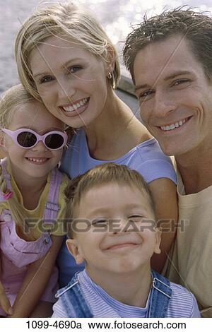 people, smiling, happy, sunglasses, outdoors, smile, family View Large Photo Image Stock Image - people, smiling, happy, sunglasses, outdoors, smile, family. Fotosearch