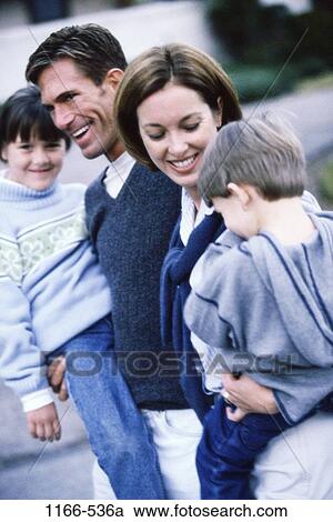 people, smiling, holding, outdoors, carrying, unity, family View Large Photo Image Stock Image - people, smiling, holding, outdoors, carrying, unity, family. Fotosearch