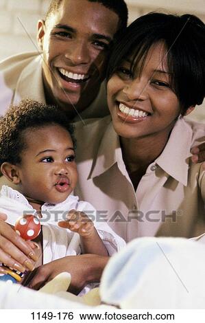 people, smiling, mother, baby, pleasant, family, proud View Large Photo Image Stock Photograph - people, smiling, mother, baby, pleasant, family, proud. Fotosearch