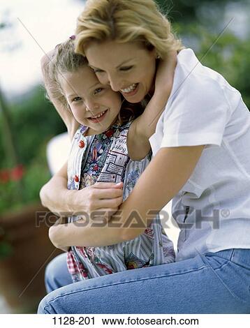people, smiling, mother, happy, holding, hugging, family View Large Photo Image Stock Image - people, smiling, mother, happy, holding, hugging, family. Fotosearch